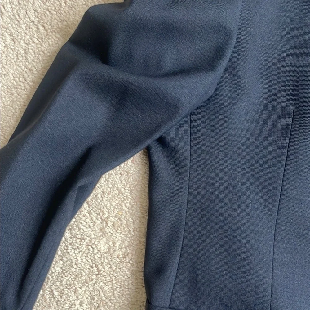 Blue Fitted Blazer with Notched Lapels and Textured Fabric